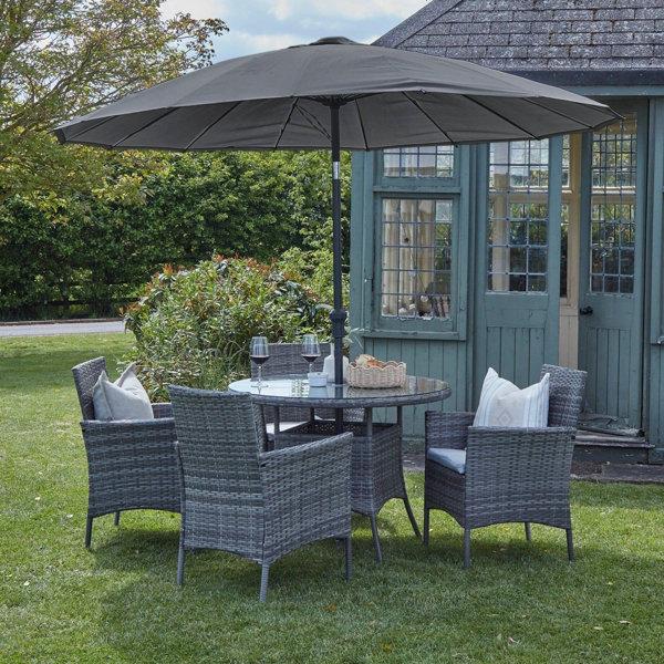 Dubose Round Dining Set with Cushions and Umbrella